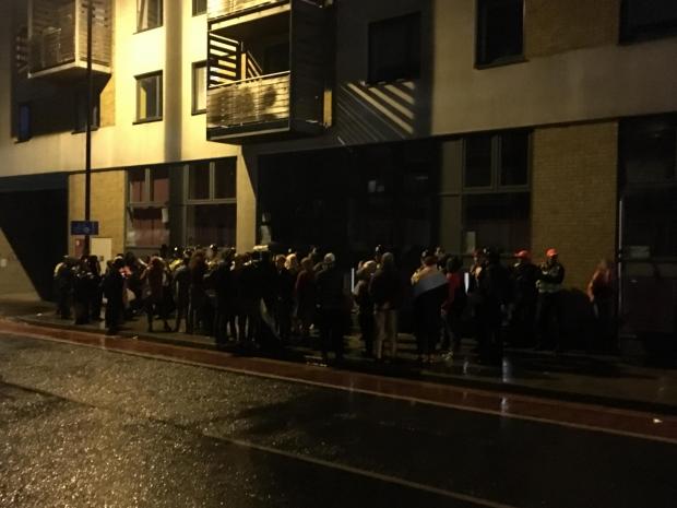 TQ+ protests bang on the windows of WPUK 2019 Meeting, another angle